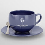 Front View of Tea Cup Mockup Featuring Saucer and Silver Spoon