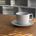 Front View of Tea Cup Mockup on Wooden Desk
