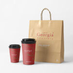 Front View of Two Coffee Cups and a Paper Bag Mockup