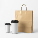 Front View of Two Coffee Cups and a Paper Bag Mockup