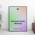 Front View of Vertical Poster Frame Mockup with Plant