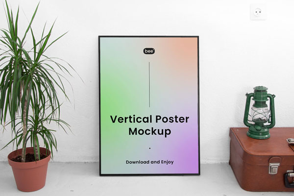Front View of Vertical Poster Frame Mockup with Plant