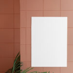 Front View of Vertical Poster Mockup on Ceramic Wall