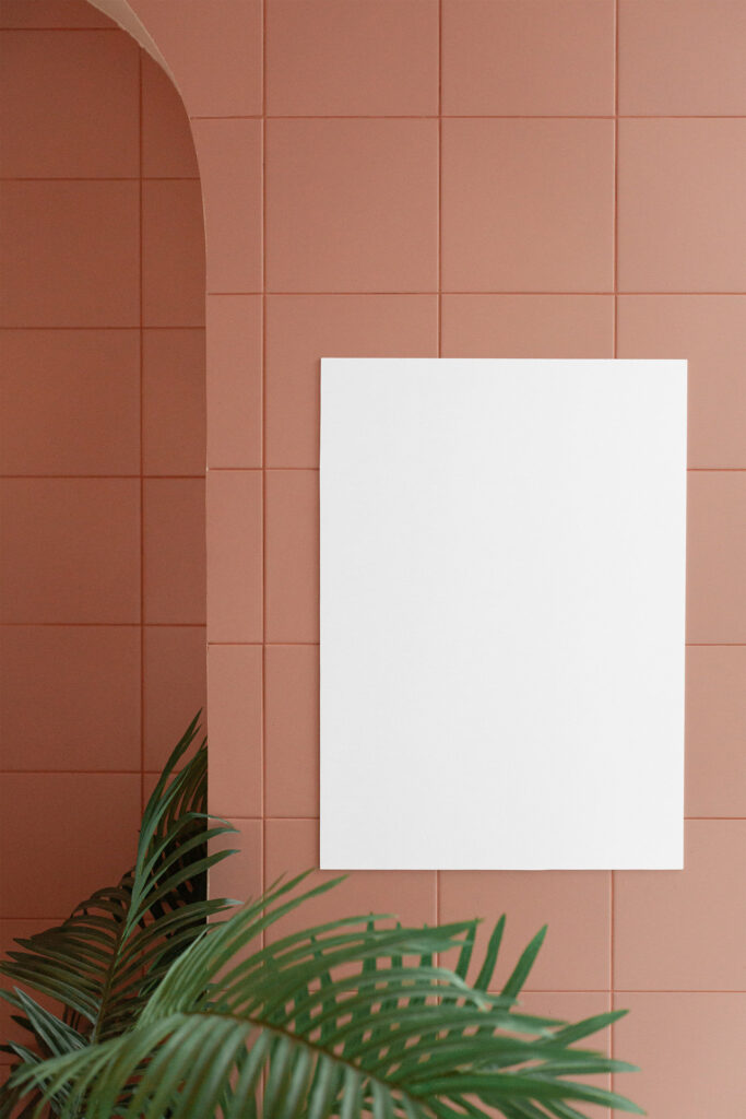 Front View of Vertical Poster Mockup on Ceramic Wall