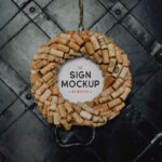 Front View Round Restaurant Sign Mockup Against Metal Wall