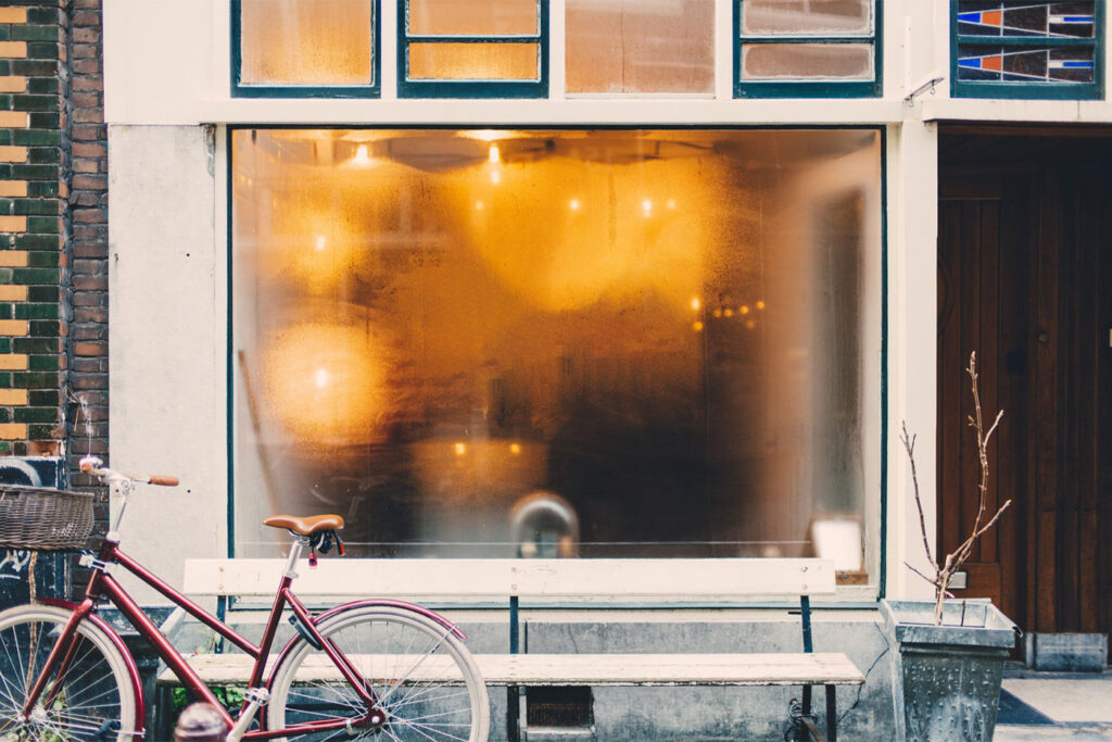 Front View Steamed Window Mockup with a Bicycle