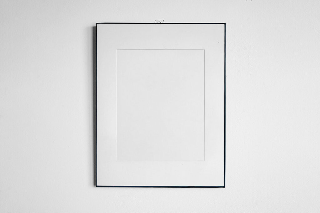 Front View Vertical Frame Hanging on Wall Mockup