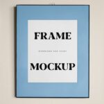 Front View Vertical Frame Hanging on Wall Mockup
