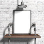 Front-View, Vertical Poster Frame on a Wooden Shelf Mockup