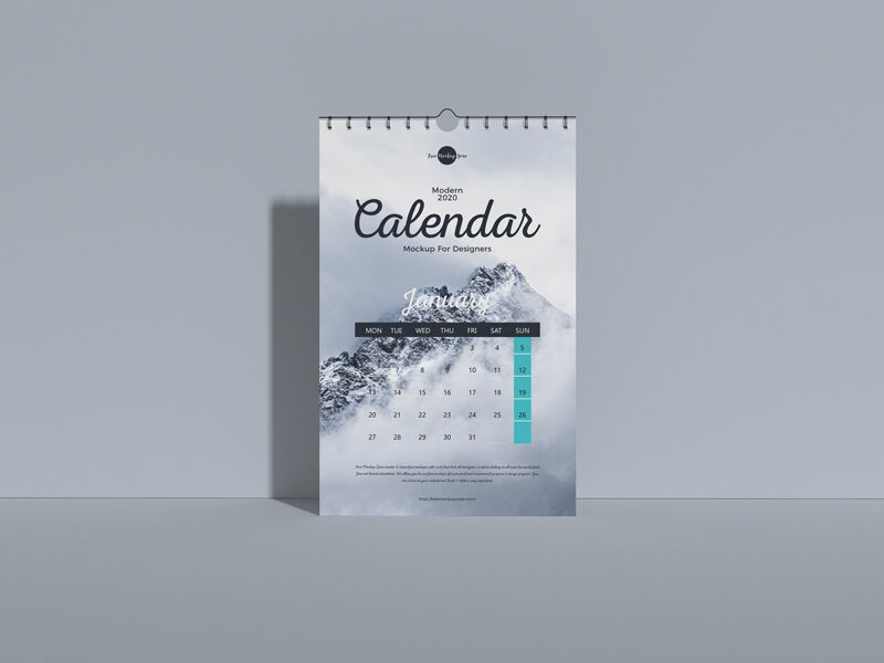 Front View Vertical Wall Calendar Mockup Standing Against the Wall