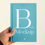 Front Vision of Book Cover Mockup in Hand