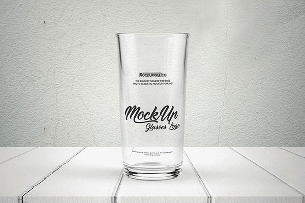 Full/Empty Glass of Water on a Wooden Surface Mockup