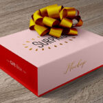 Gift Packaging Box with a Ribbon Flower Mockup