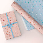 Gift Wrapping Paper Rolled and Flat Mockup with Wrapped Gift