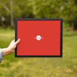Girl Showing Frame in a Outdoor Environment Mockup