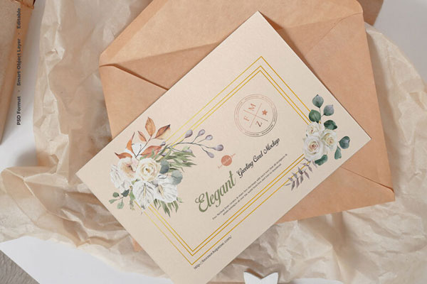 Greeting Card Laid on Kraft Envelope in Top View Mockup