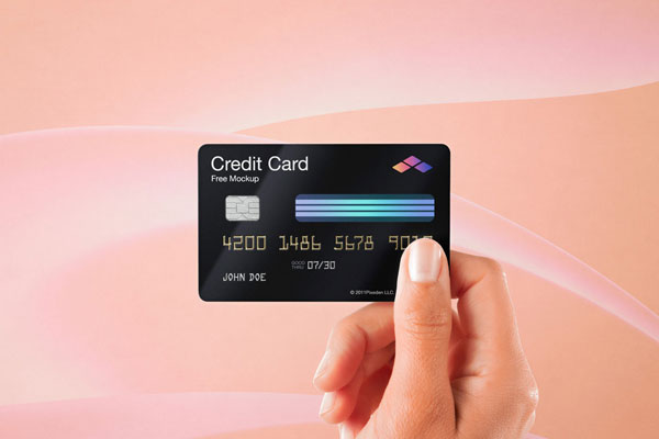 Hand Holding Credit Card Mockup in Front View