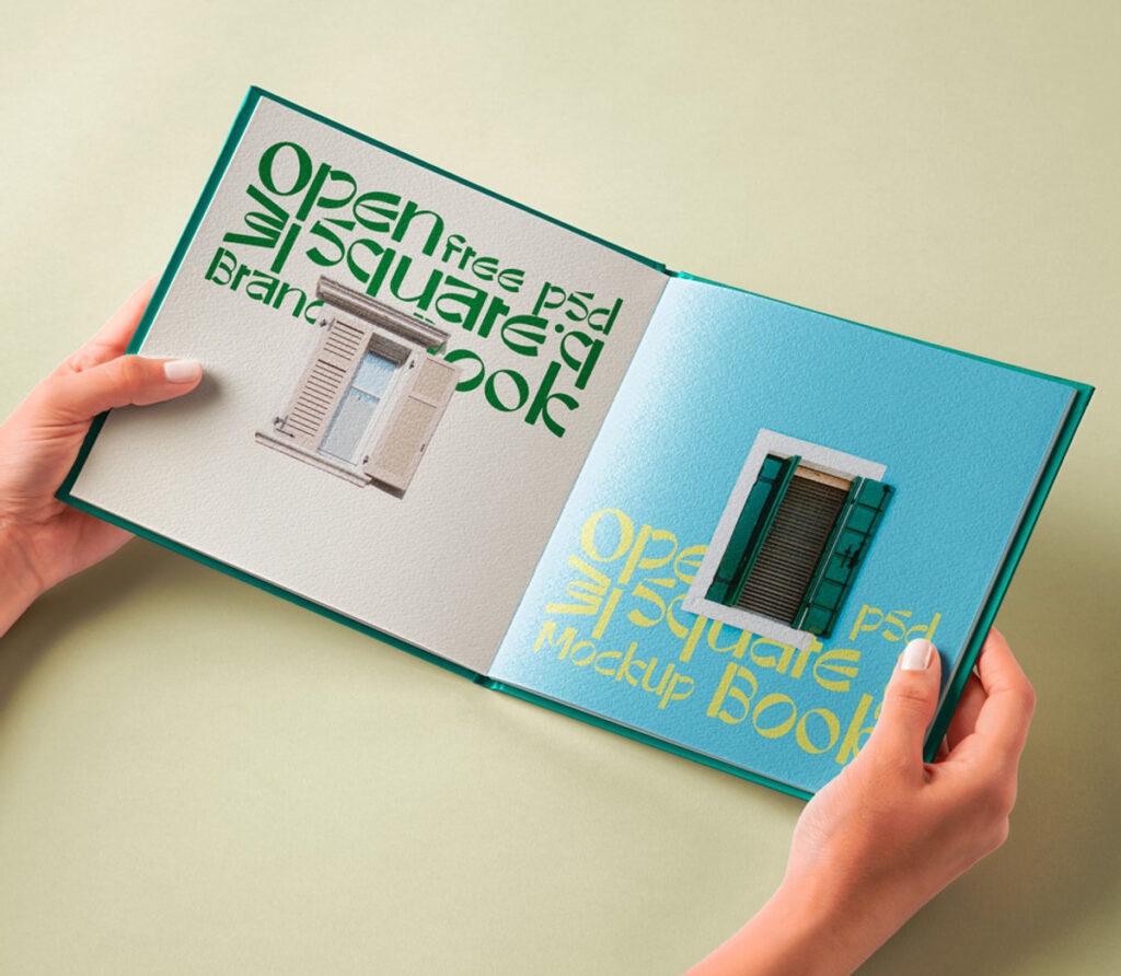 Hand Holding Hardcover Open Book Mockup in Perspective View