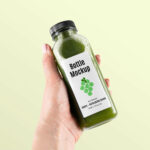 Hand-holding Healthy Bottle Mockup