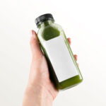 Hand-holding Healthy Bottle Mockup