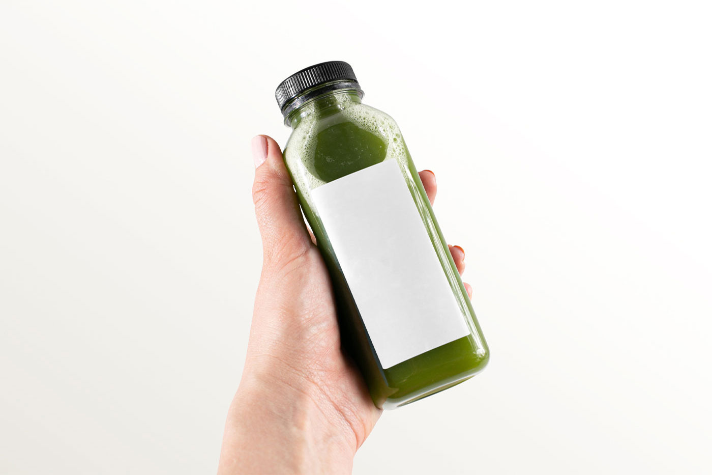 Hand-holding Healthy Bottle Mockup FREE PSD