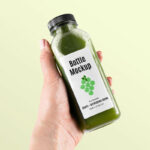 Hand-holding Healthy Bottle Mockup