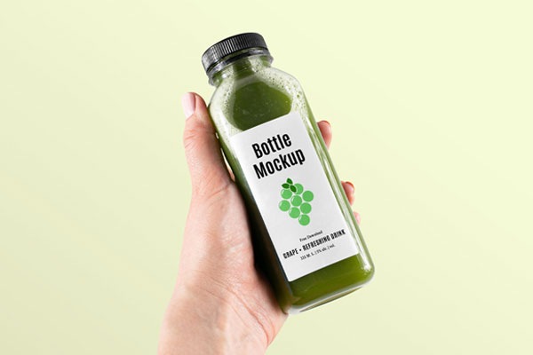 Hand-holding Healthy Bottle Mockup