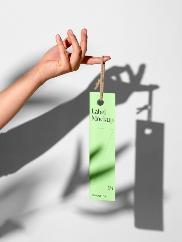 Hand Holding Vertical Label Mockup