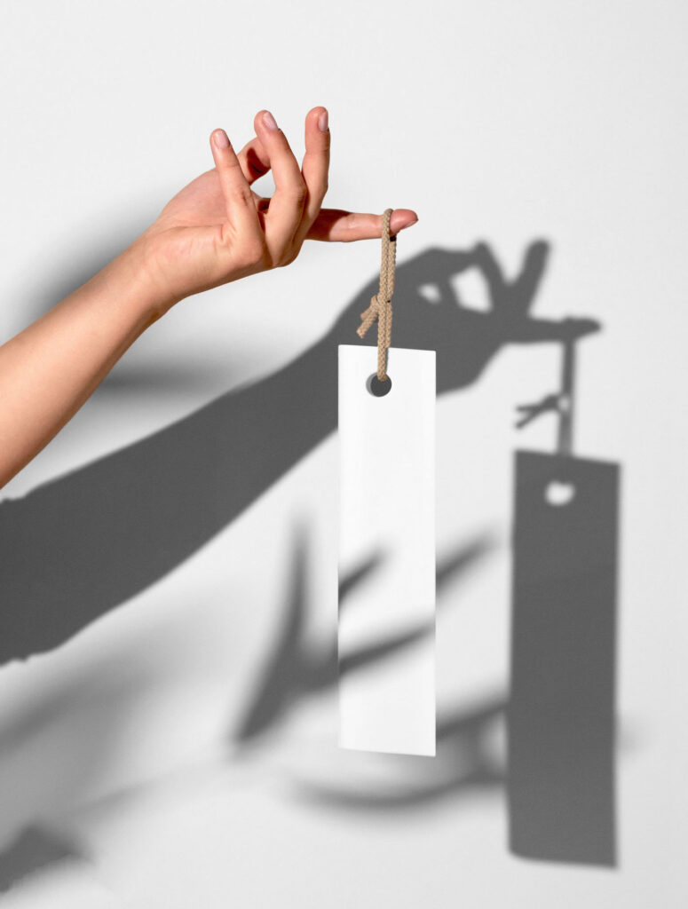 Hand Holding Vertical Label Mockup
