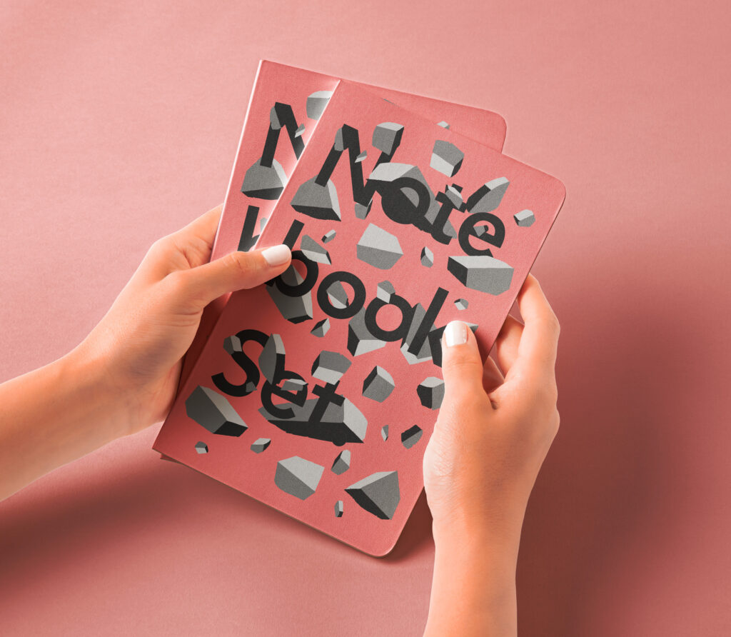 Hands Holding Notebook Mockup in Perspective View