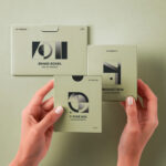 Hands Holding Product Boxes Mockup in Top Sight