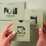 Hands Holding Product Boxes Mockup in Top Sight