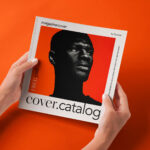 Hands Holding Square Catalog Mockup in Perspective View