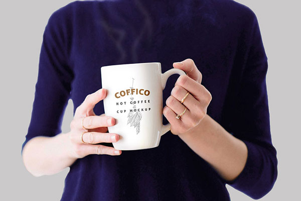 Hands of a Woman Holding a Coffee Mug Mockup