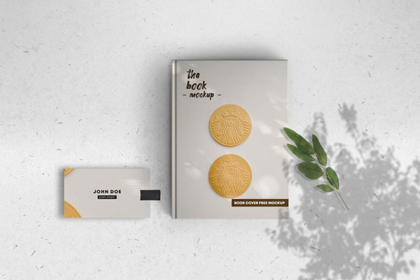 Hardcover Book Along with Business Card in Top View Mockup
