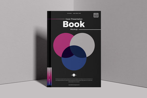 Hardcover Book Standing at the Corner of Two Walls Mockup