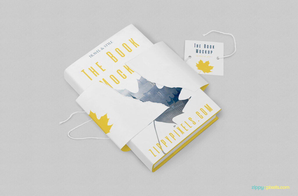 Hardcover Book With Torn Special Wrapping Plus a Tag Mockup