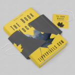 Hardcover Book With Torn Special Wrapping Plus a Tag Mockup