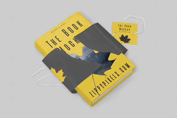 Hardcover Book With Torn Special Wrapping Plus a Tag Mockup