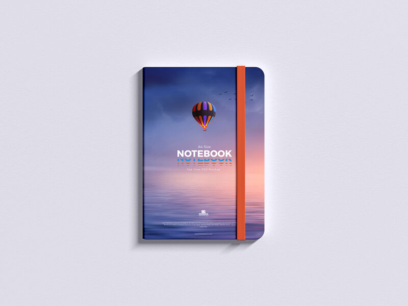 Hardcover Notepad with Elastic Band in Top View Mockup