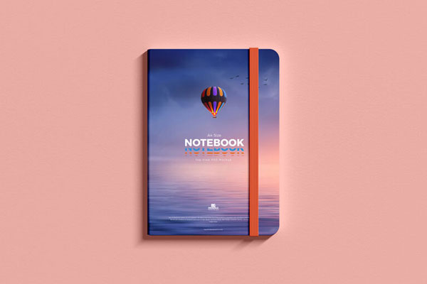Hardcover Notepad with Elastic Band in Top View Mockup