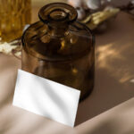 Horizontal Stationery Card Mockup with Vase in Perspective View