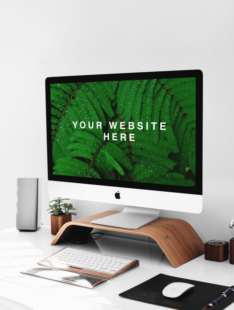iMac on Wooden Stand on a Desk Mockup
