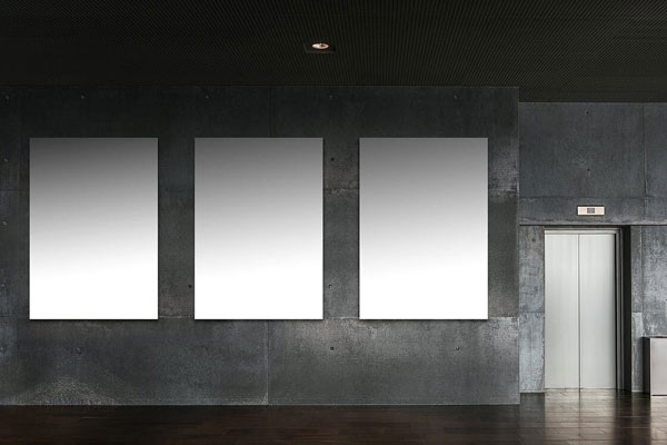 Indoor Scene Mockup Showing Three Billboards Attached to a Wall