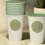 Interior Coffee Cup Logo Mockup on a Surface