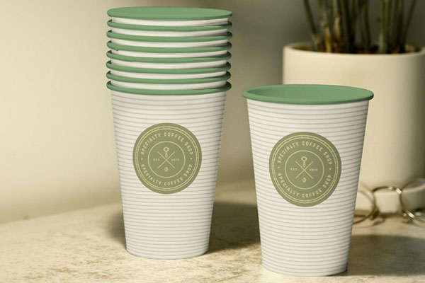 Interior Coffee Cup Logo Mockup on a Surface