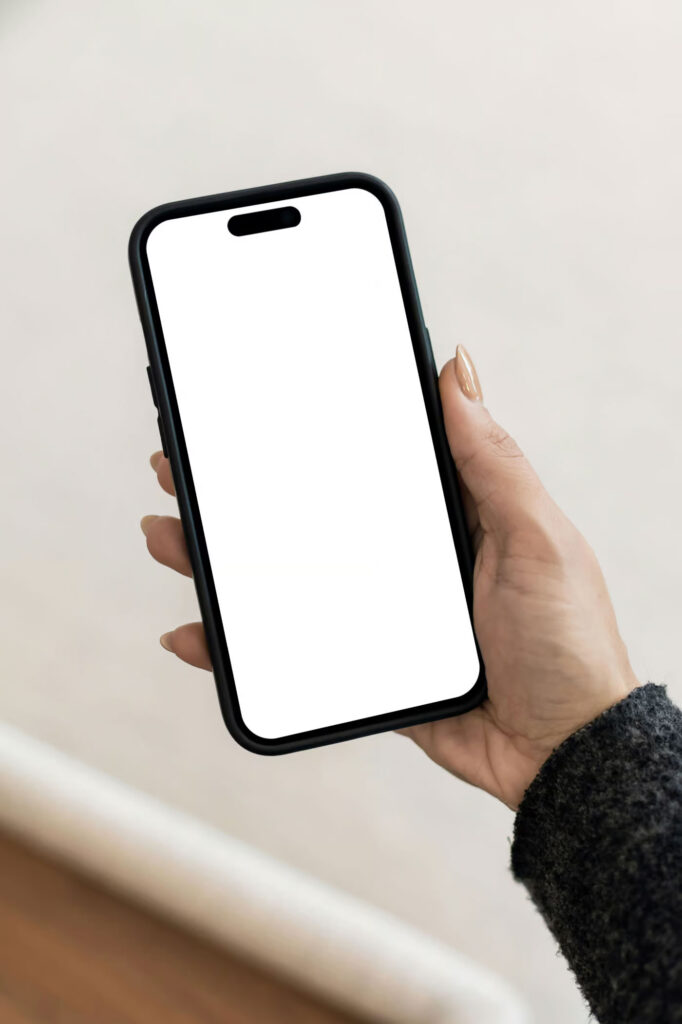 iPhone 14 Pro in Hand Mockup
