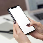 iPhone in Woman Hands Mockup