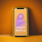 iPhone on Concrete Wall Mockup