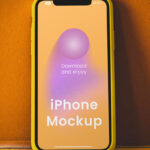 iPhone on Concrete Wall Mockup